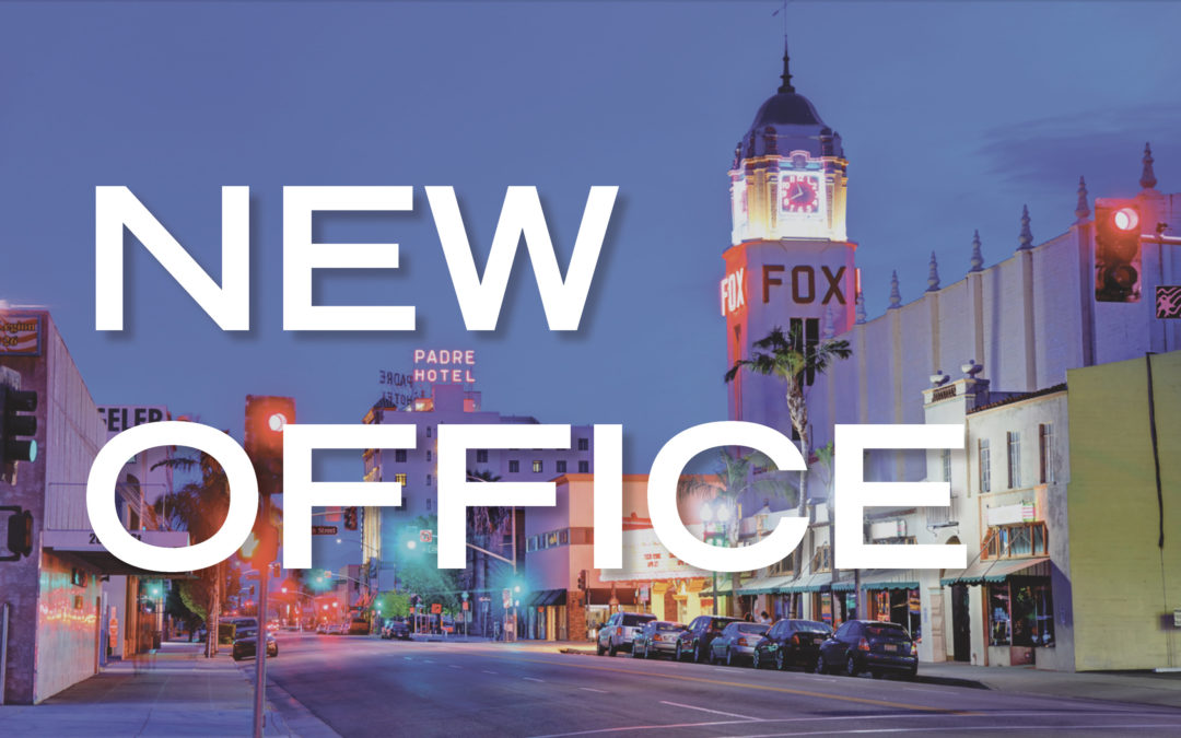 A photo of downtown Bakersfield with text reading "new office"