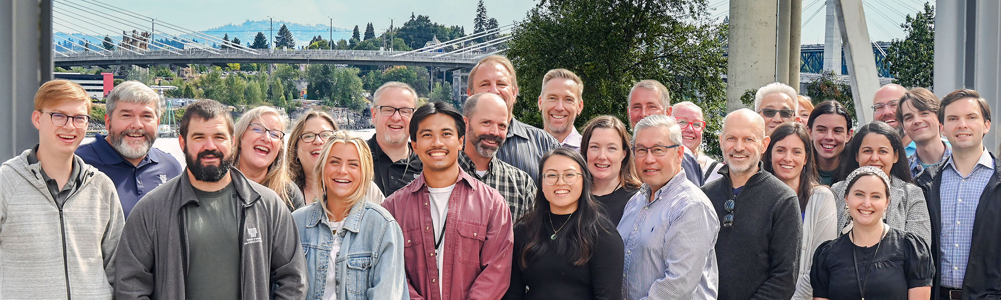 DEA staff standing in a row and smiling for the camera